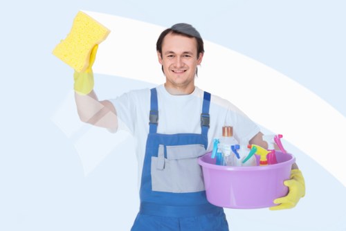 Glossy Cleaners staff performing window cleaning